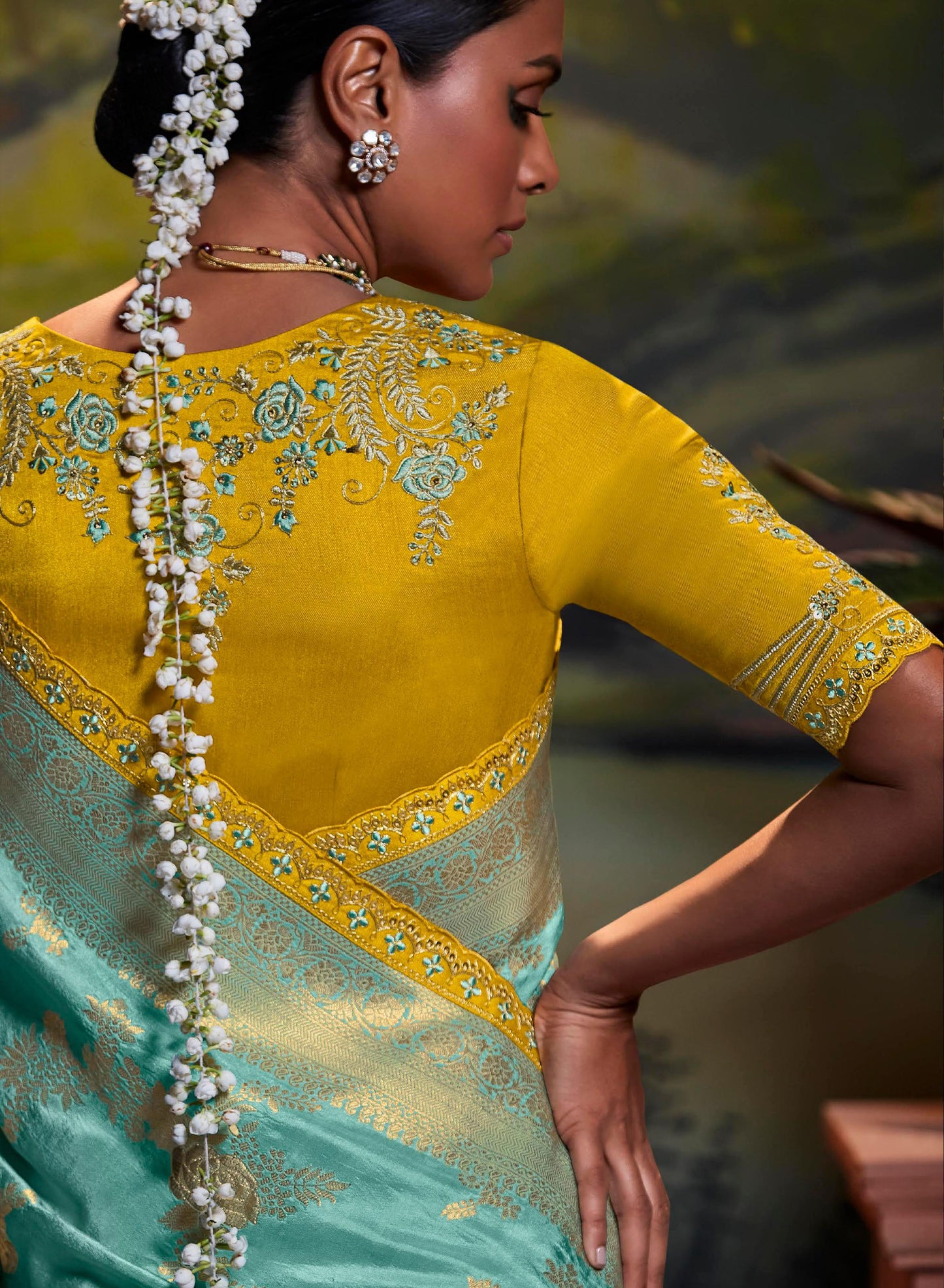 Teal green Dola Silk Sequins embroidered Parnika Festive Saree