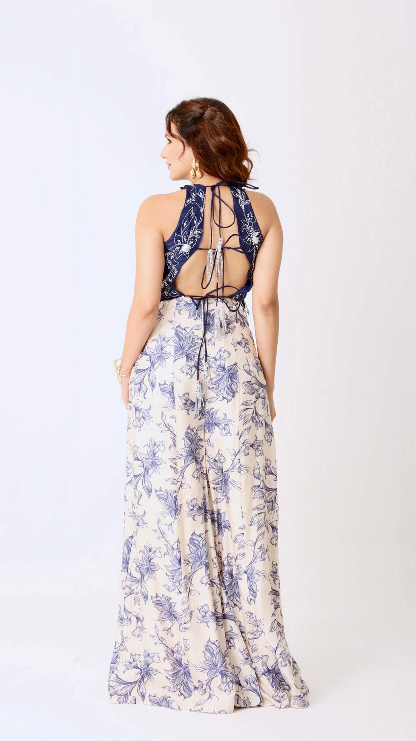 Navy organza hand-embroidered halter top with flowy ivory floral kali pants
