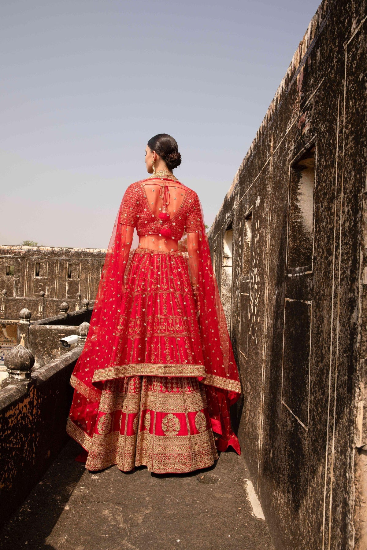 Sundaram, the eternal festive elegance Red Bridal Lehenga