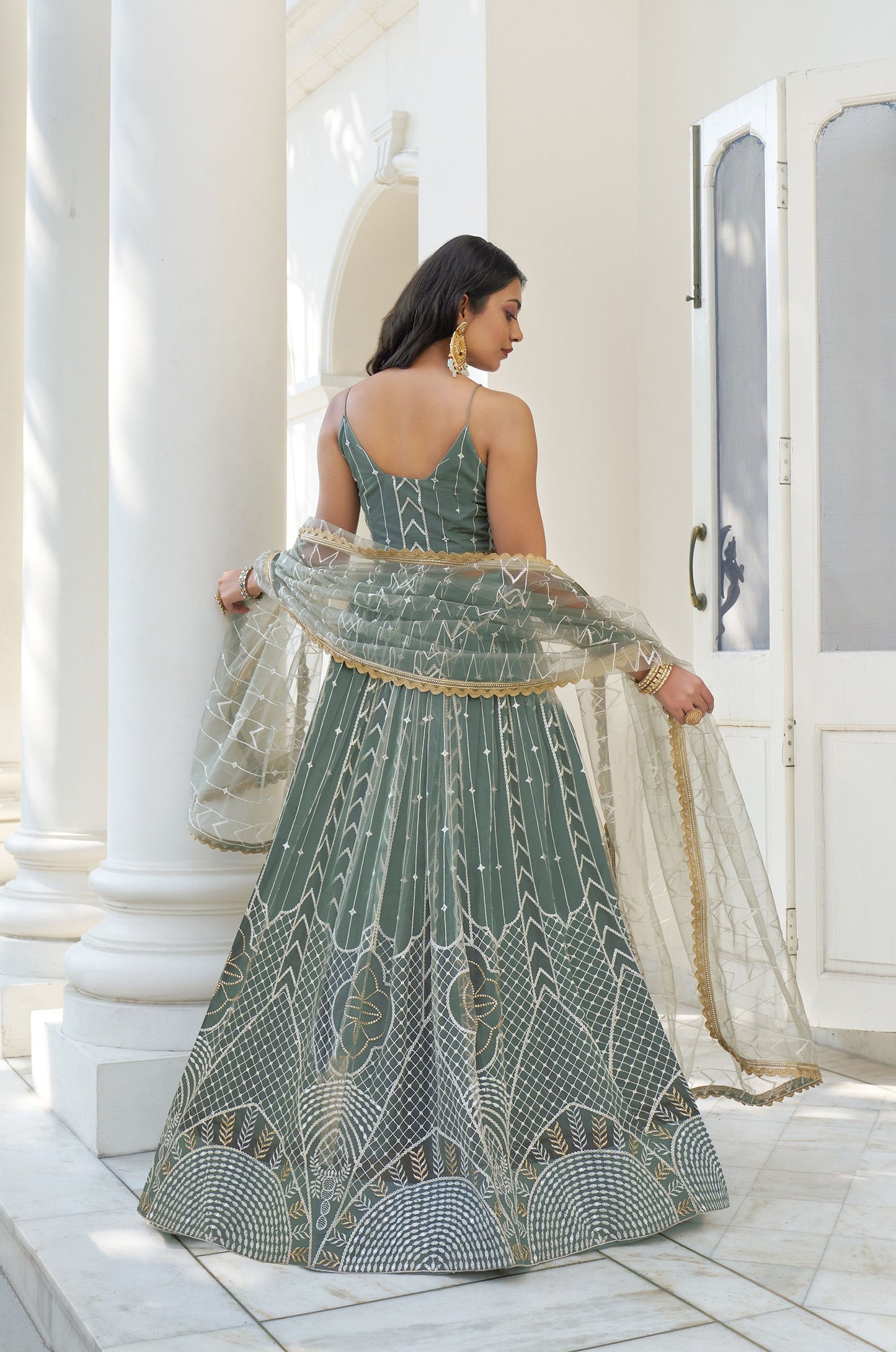 Light Green Butterfly Net Thread & Sequins Embroidered Mehendi Lehenga