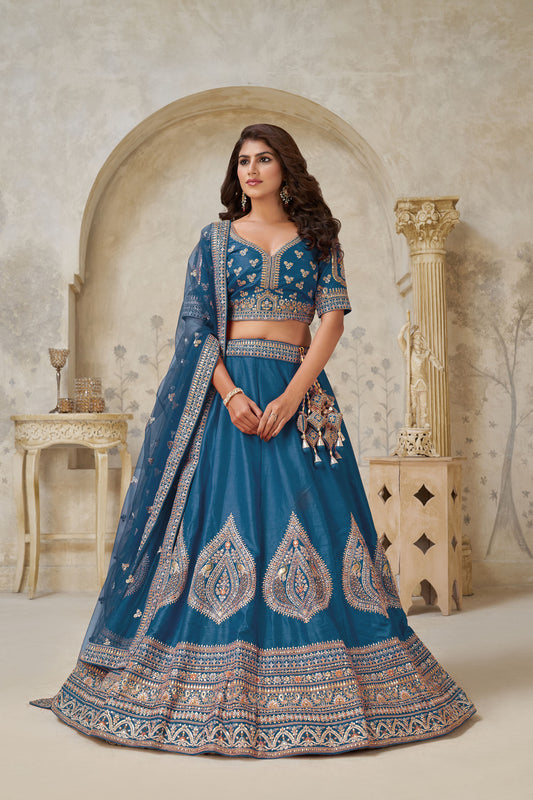 Teal Blue Silk Wedding Lehenga with Leaf & Peacock Motifs