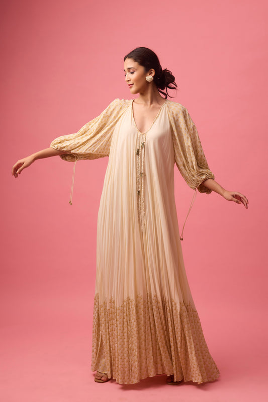 Off white Georgette dress with the detailing of foiling and dangling in sleeve