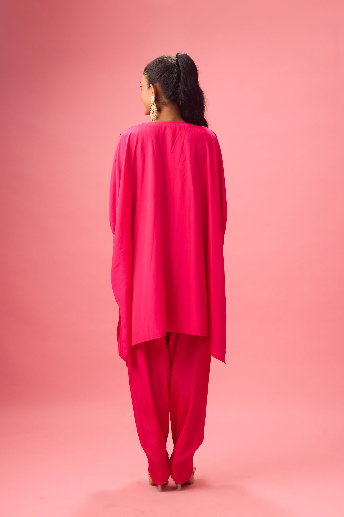 Rani Pink V neckline with dhagai and foiling kaftan detailing paired with salwar