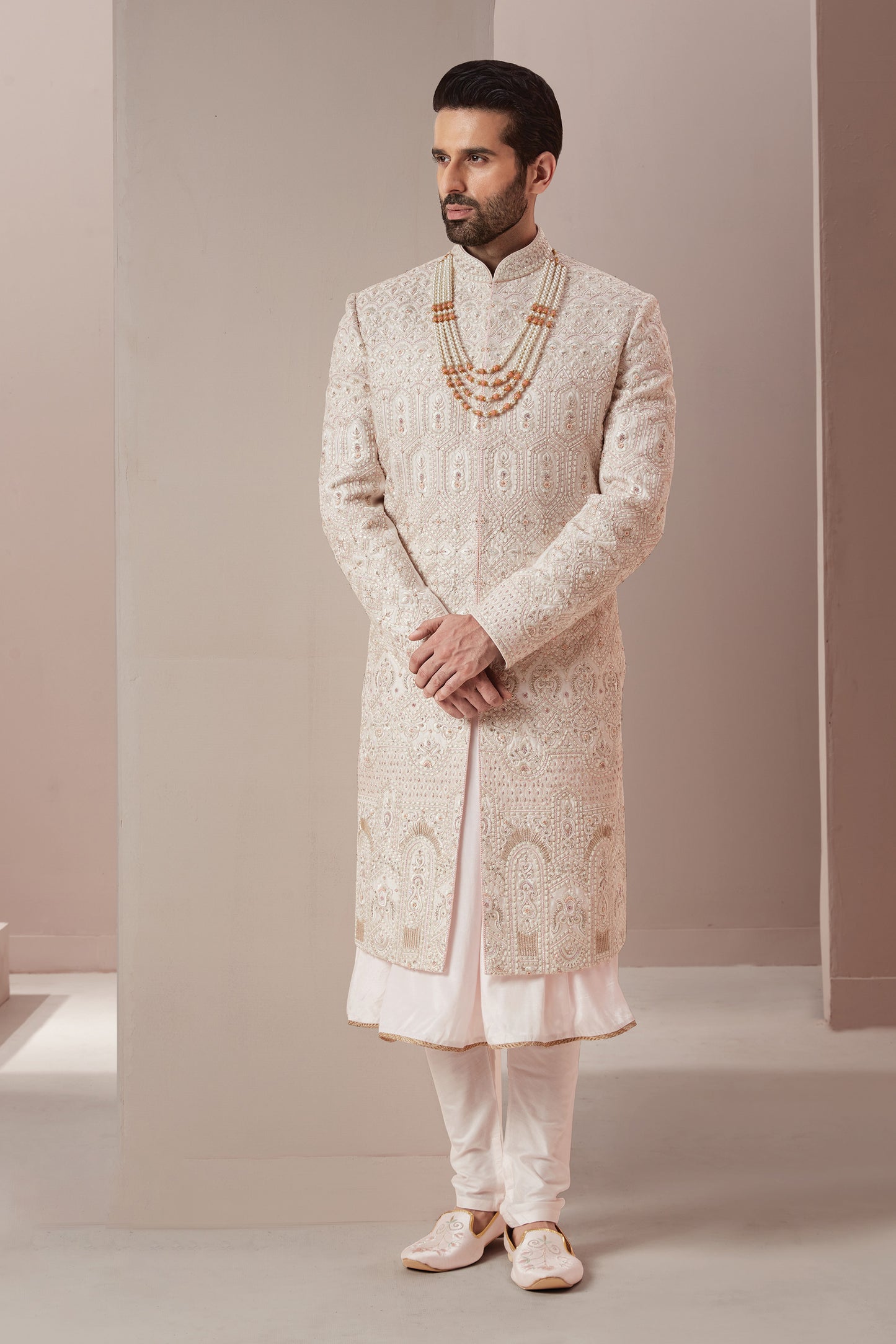 Light Pink base Silk Sherwani in Symmetric & Floral Motifs