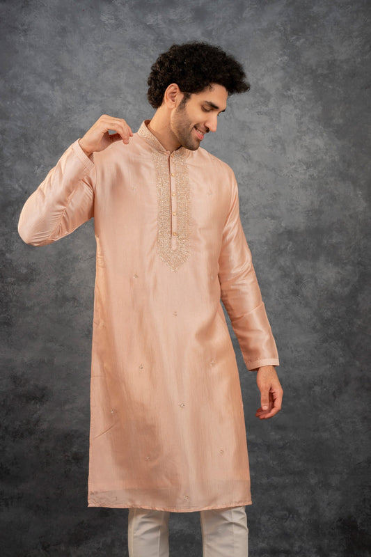 Peach silk kurta set with kasab work on the yoke
