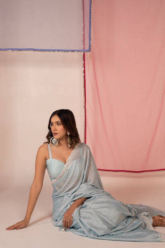 Light blue tissue silk saree and unstitched blouse piece
