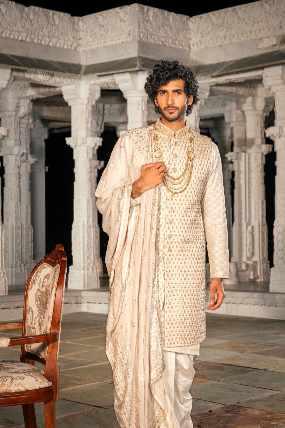 Ivory silk sherwani with hand and machine work