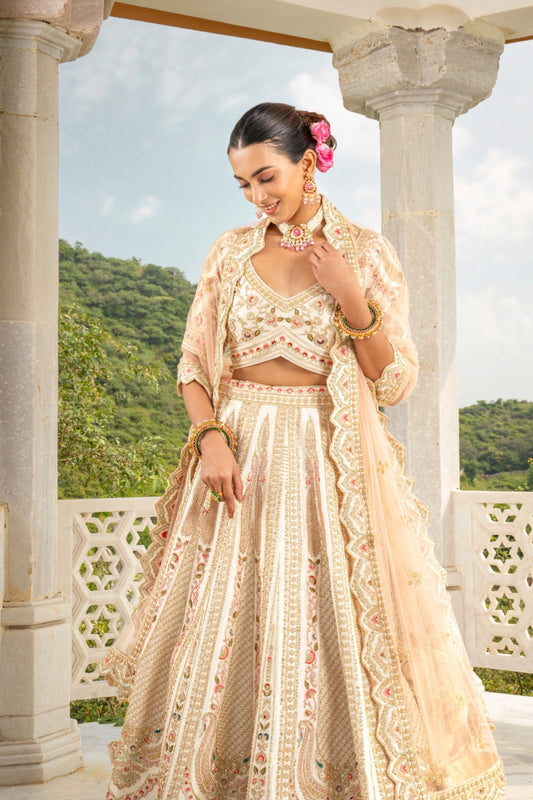 Soft champagne raw silk zardozi embroidered lehenga choli with hand cut dana, thread and pearl work