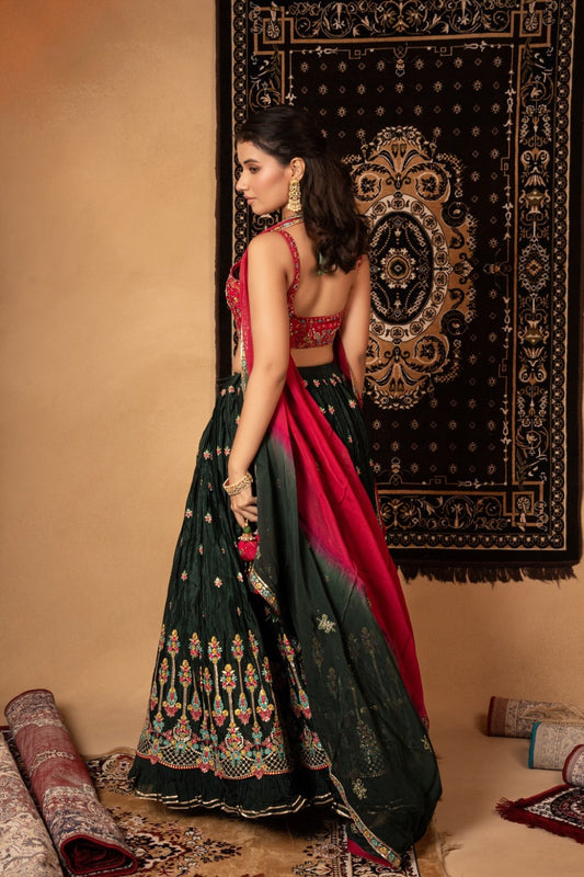 Green georgette lehenga choli with resham, tikki, and moti work