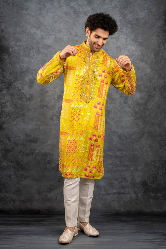 Yellow printed silk kurta set with mirror embroidery