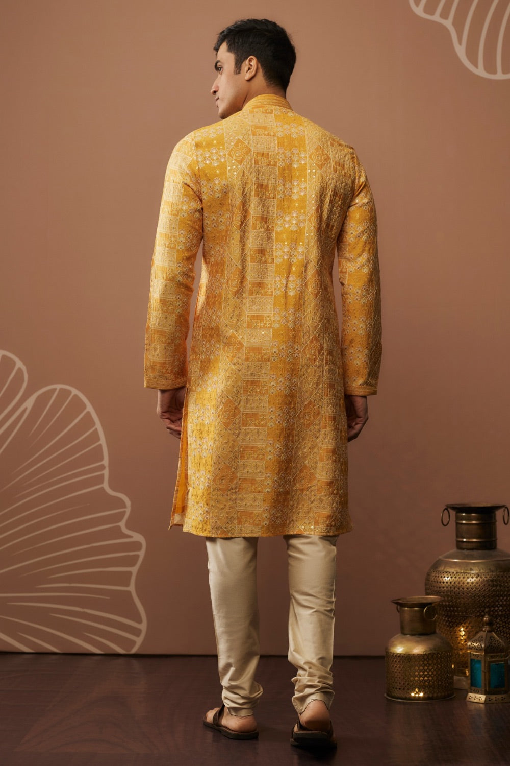 Bright yellow silk kurta and pajama with hand and machine work