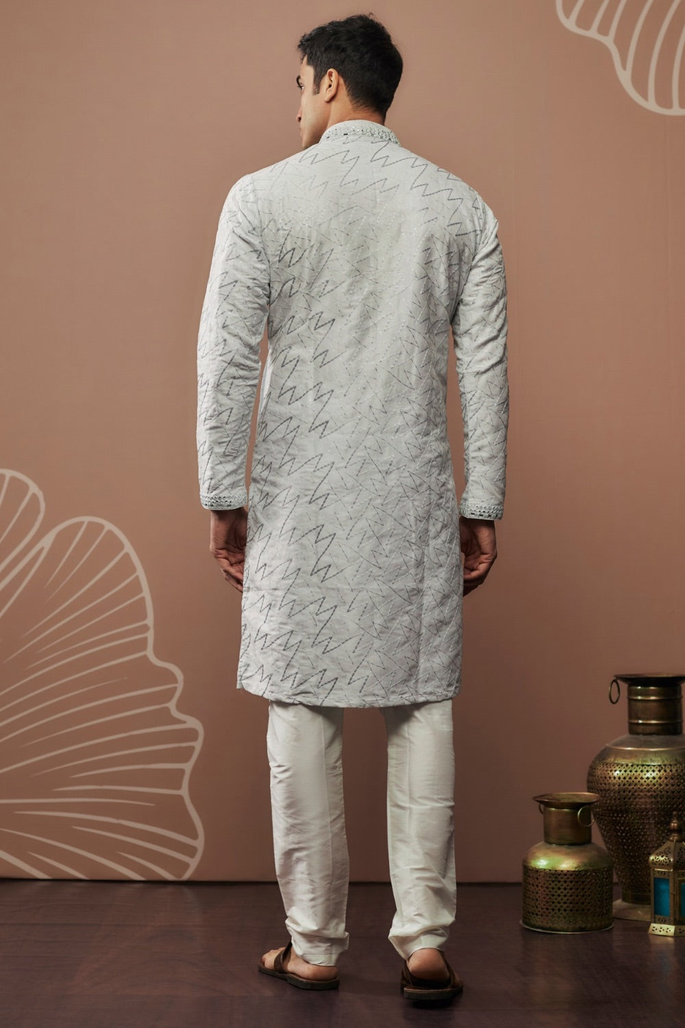 White silk kurta set with hand and machine work
