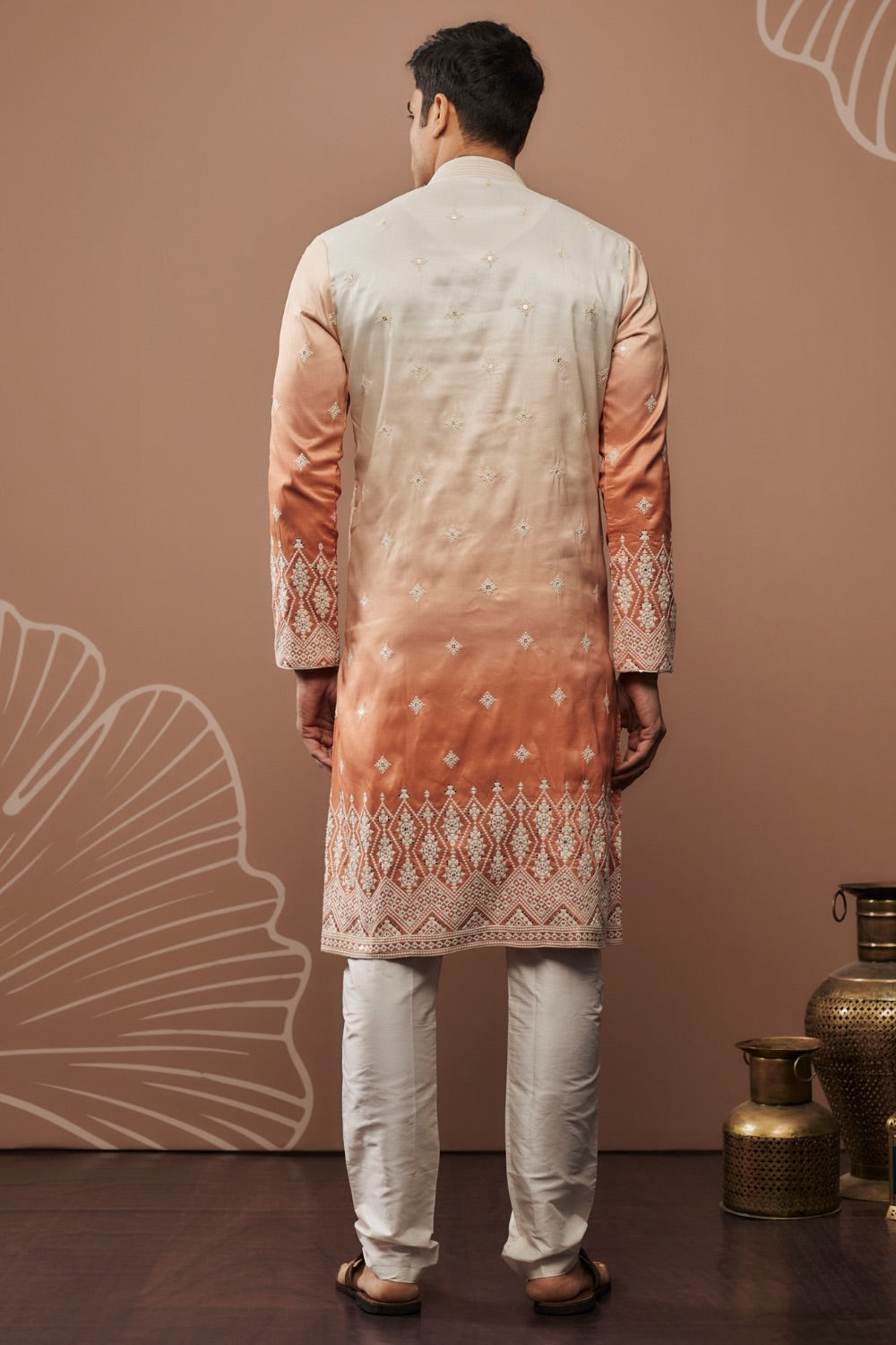 Orange shaded silk kurta & pajama with hand and machine work