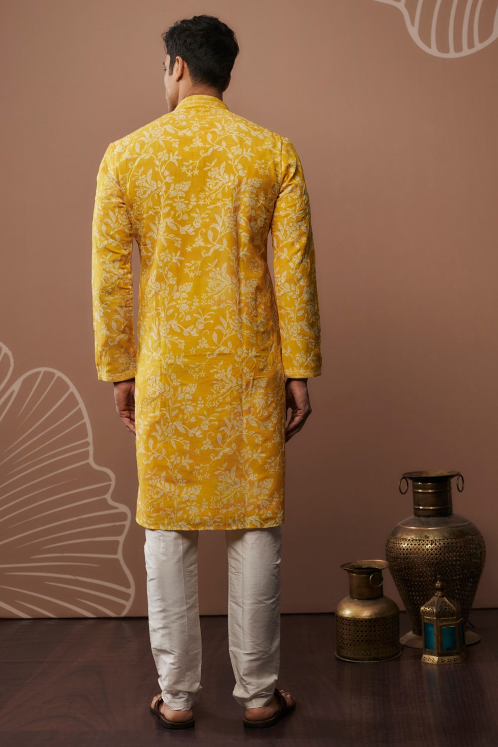 Bright yellow silk kurta and pajama with hand and machine work