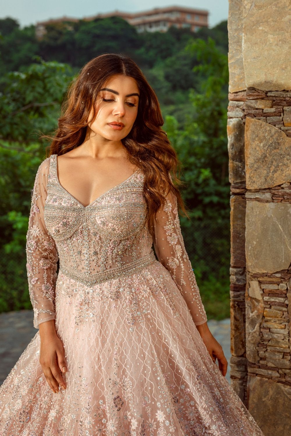 Baby pink net gown with sequins and stone work