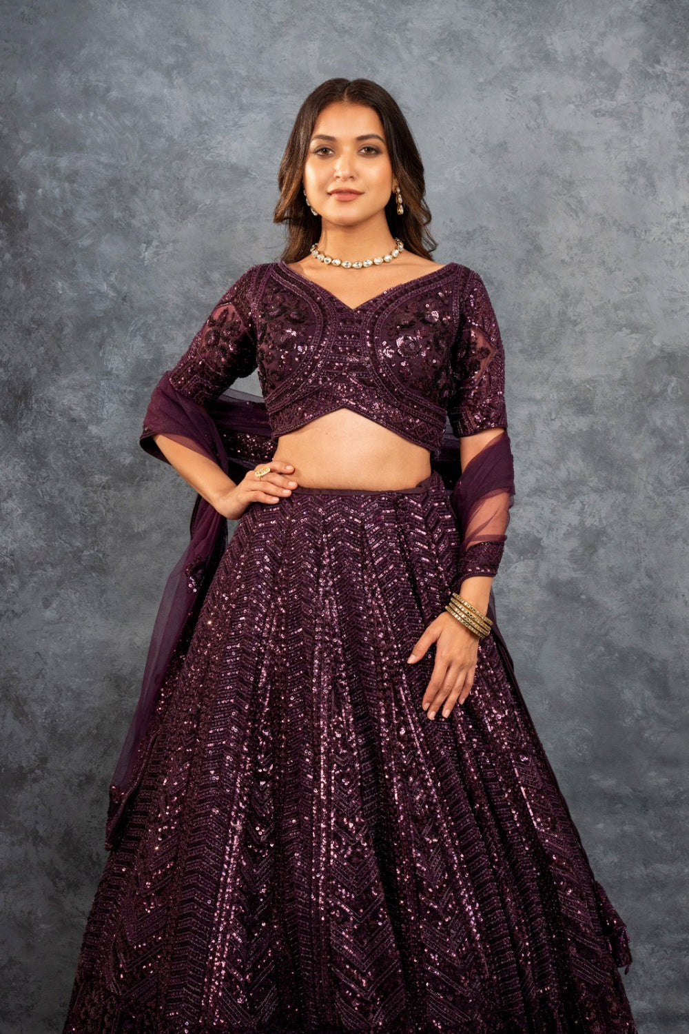 Wine net lehenga choli with sequins, hand cut dana and dori work