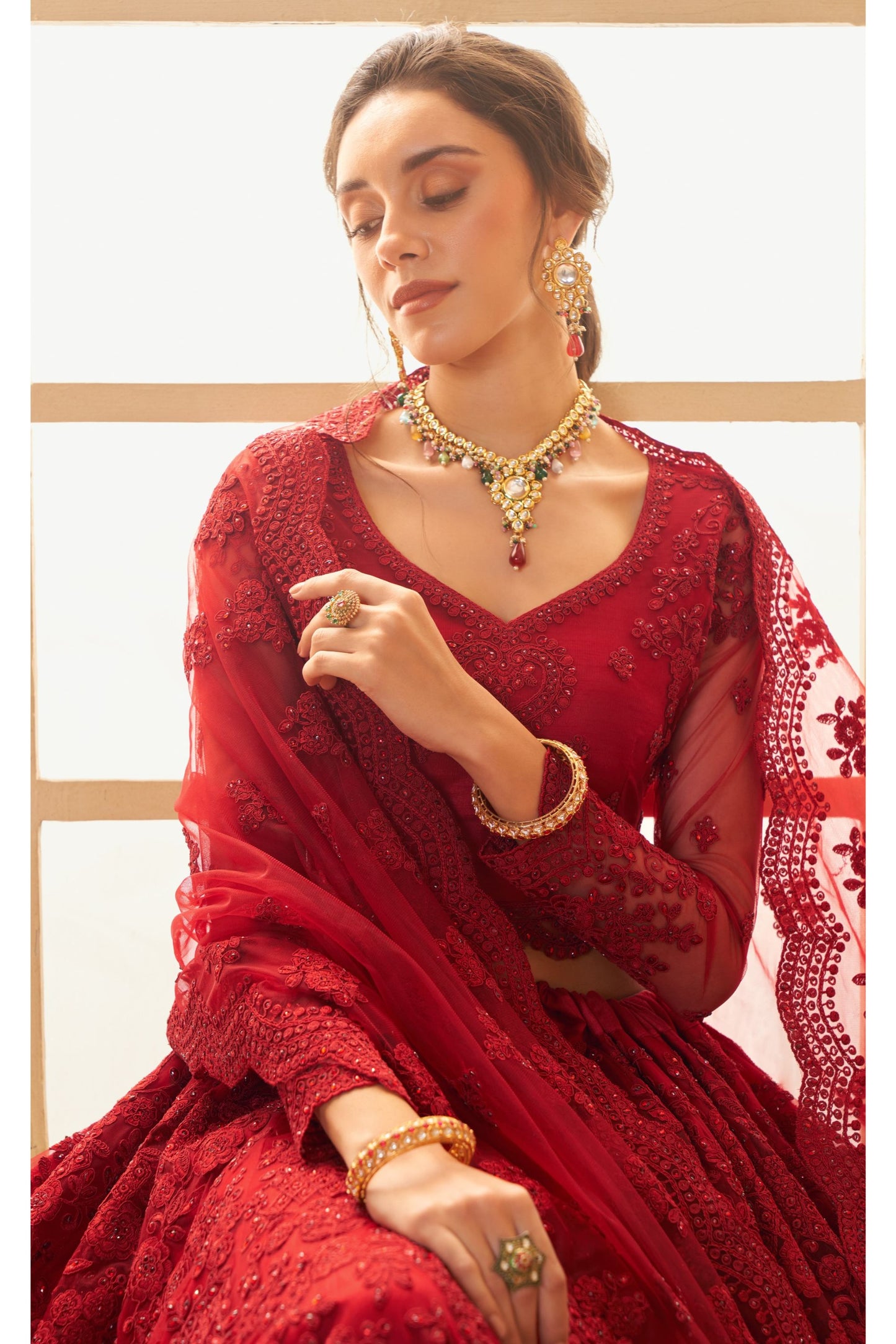 Red Heavy Cording Embroidered Net Bridal Lehenga Choli