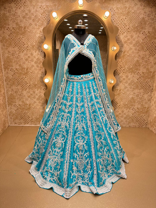Aqua Raw Silk Silver thread Embroidered Bridal Lehenga