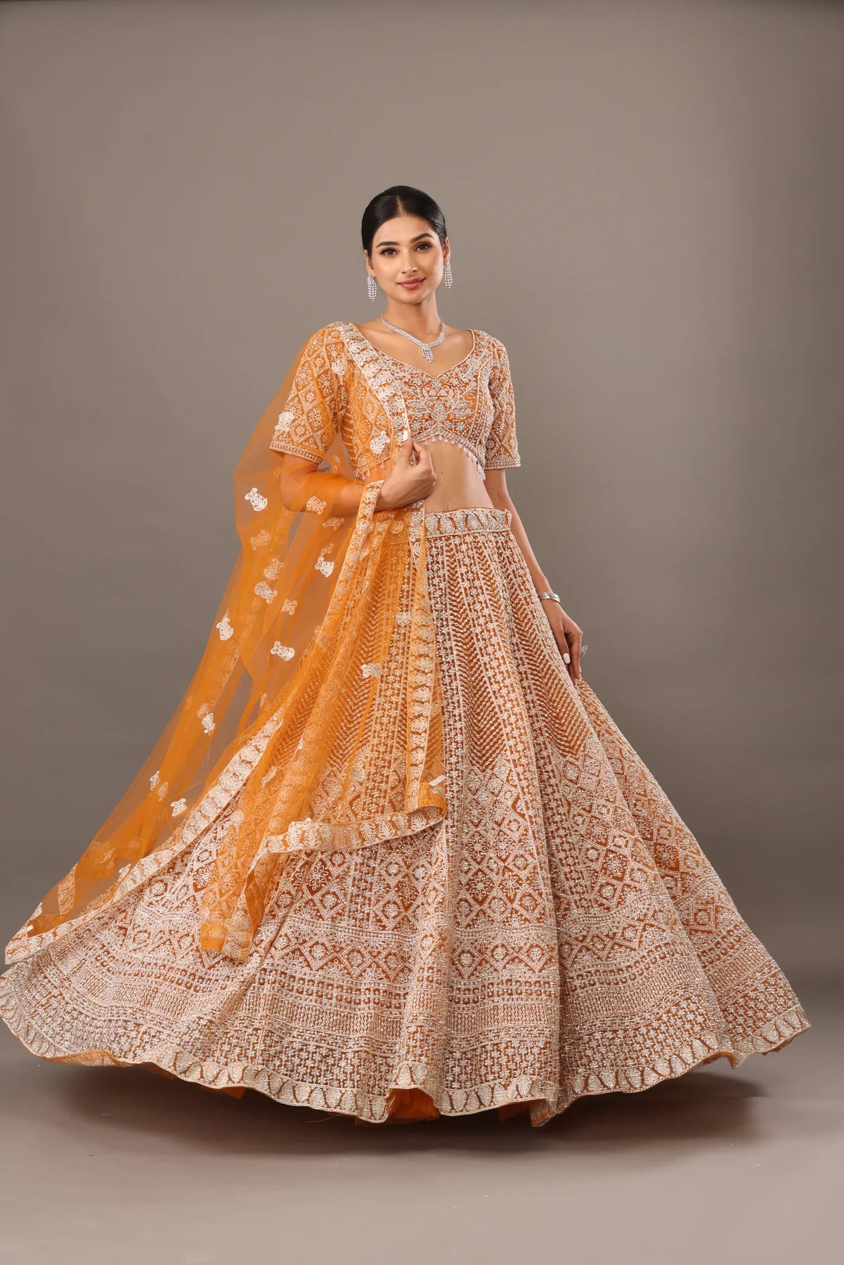 Yellow Net lehenga with embroidery bhas