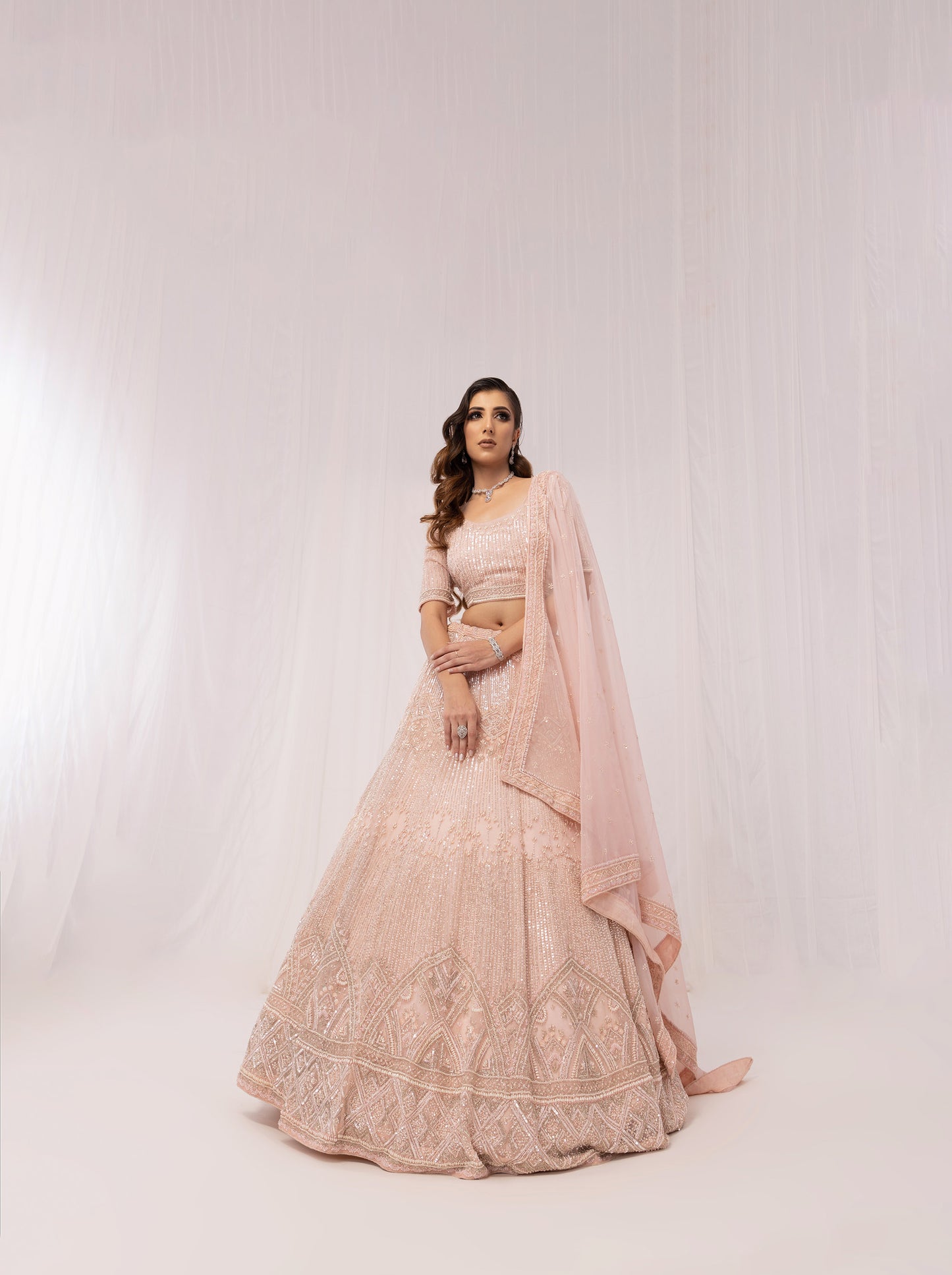 Pink Net Sequins Embroidery Reception Lehenga