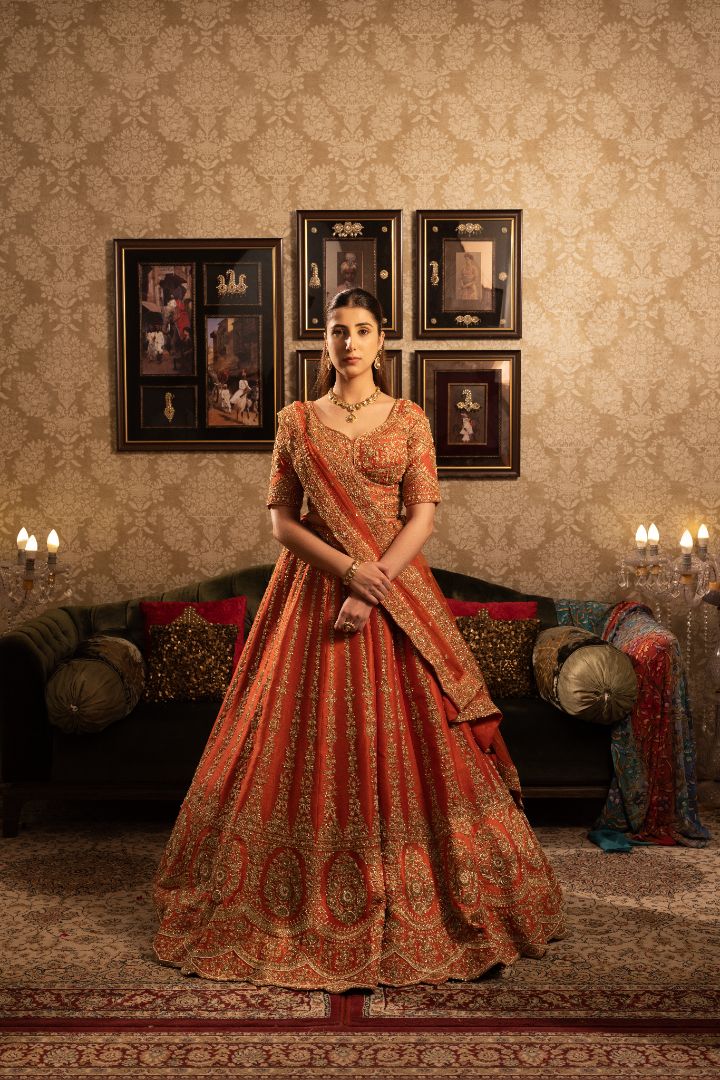 Rust Bridal Lehenga with Cutdana Sequins Gold Embellishment and Double Dupatta
