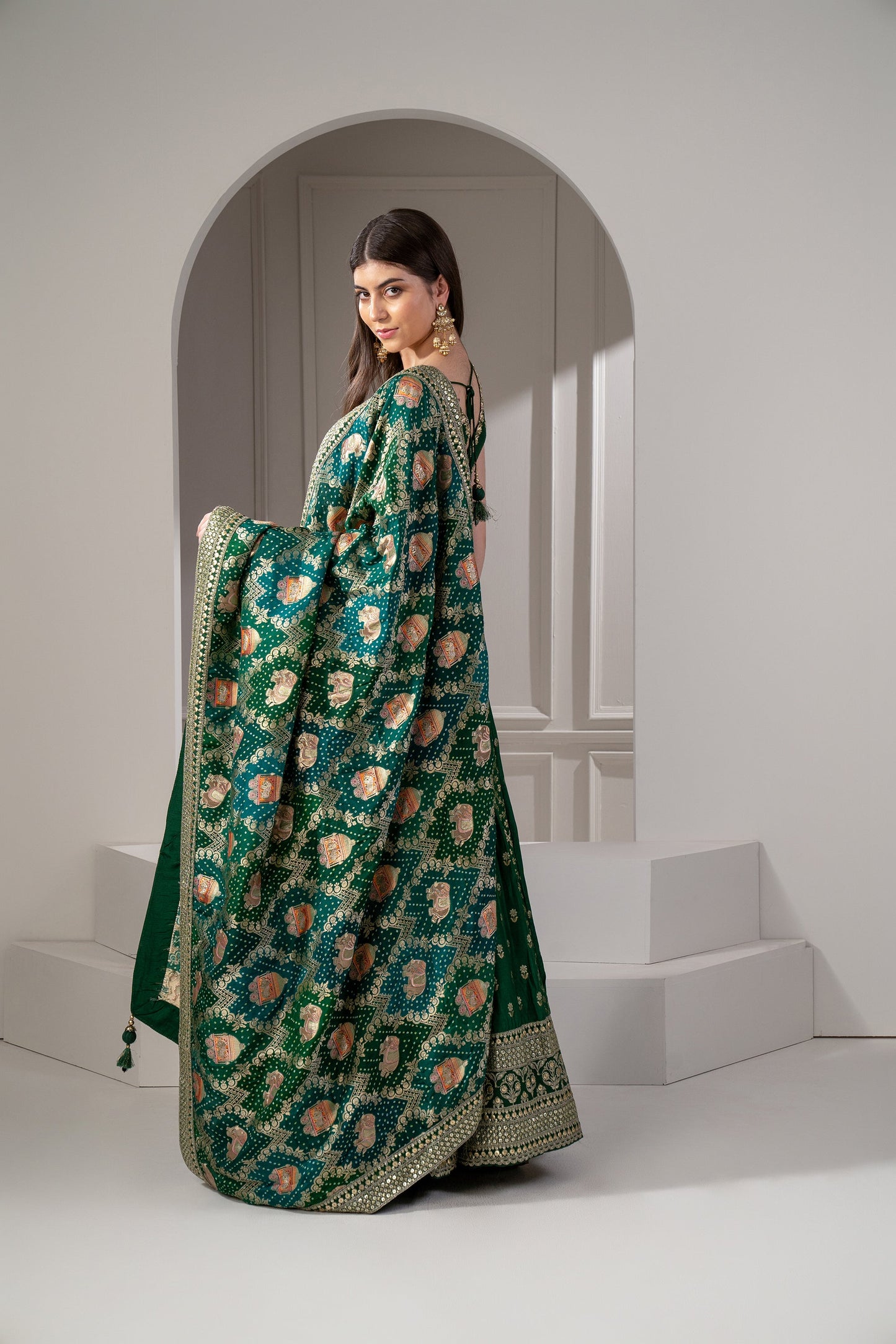 Castleton Green Sequins, Zari and Thread Embroidered Semi Silk Lehenga Set.