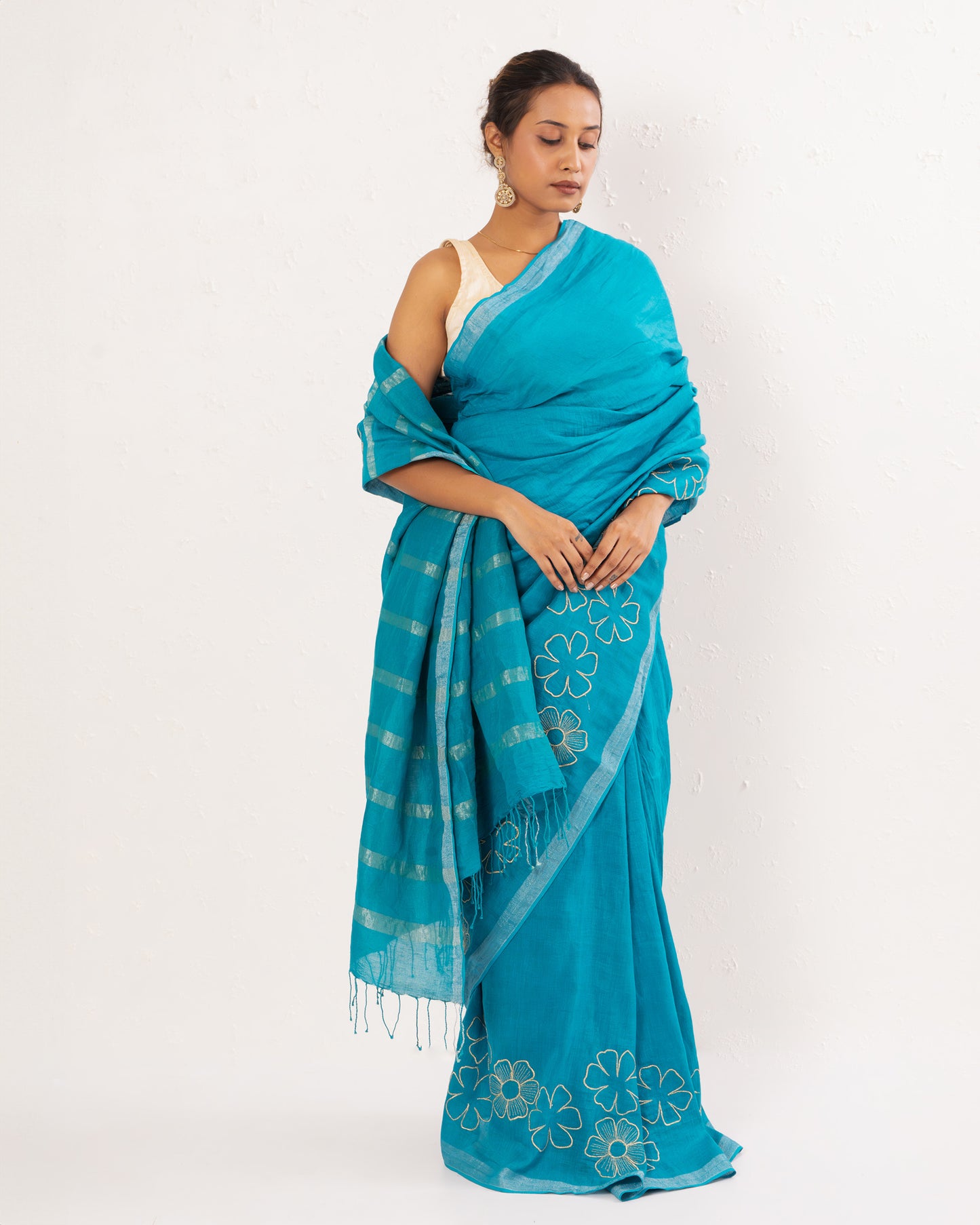 Cyan Blue embroidered handwoven linen saree