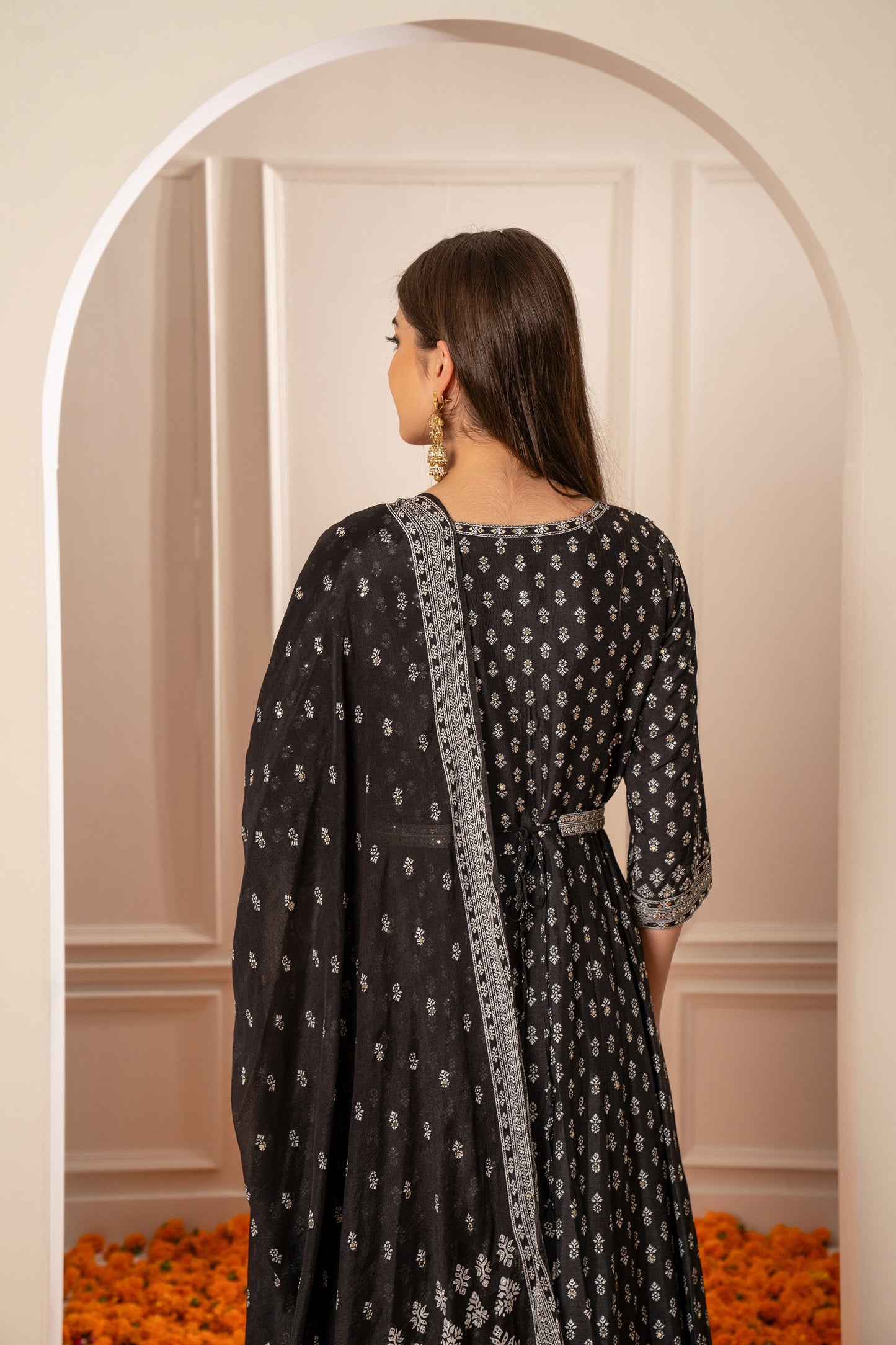 Charcoal Black Semi Silk Printed Gown with Mirror Embellishments.