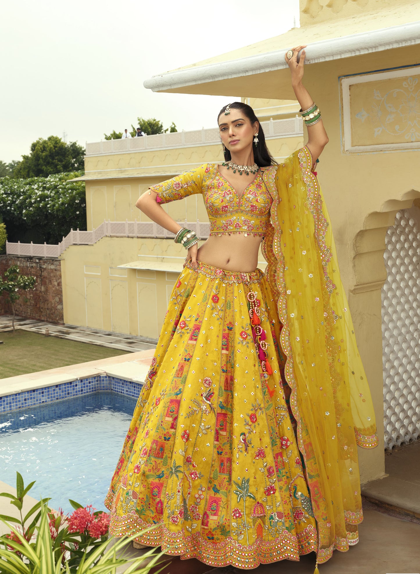 Yellow Silk Heavy Cut Work and Mirror Embroidery Haldi Lehenga for Bride