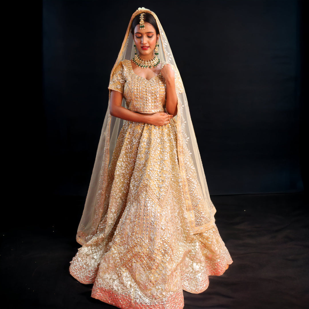 Golden Raw Silk Hand Embroidered Gotapatti Bridal Lehenga