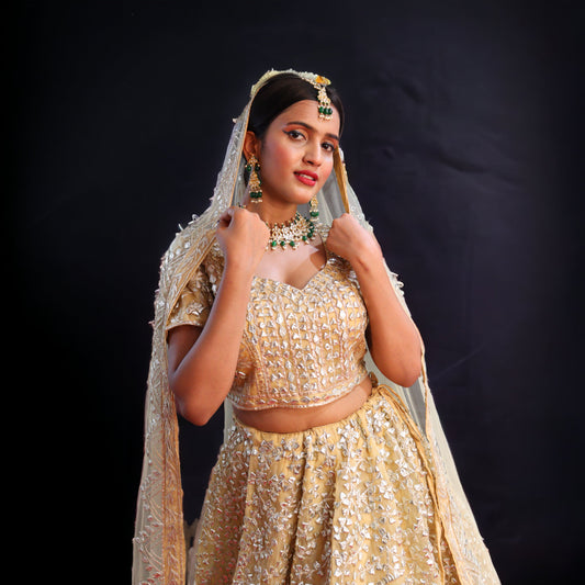 Golden Raw Silk Hand Embroidered Gotapatti Bridal Lehenga