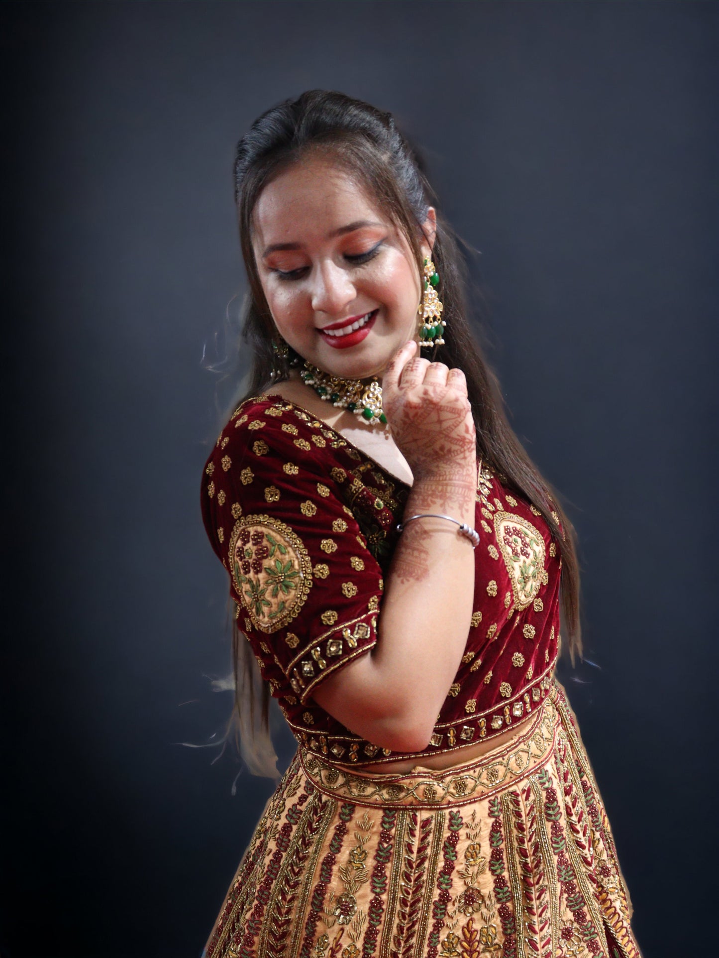 Golden and Maroon Rajwada Raw Silk Hand Embroidered Antique Work Bridal Lehenga