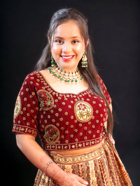 Golden and Maroon Rajwada Raw Silk Hand Embroidered Antique Work Bridal Lehenga