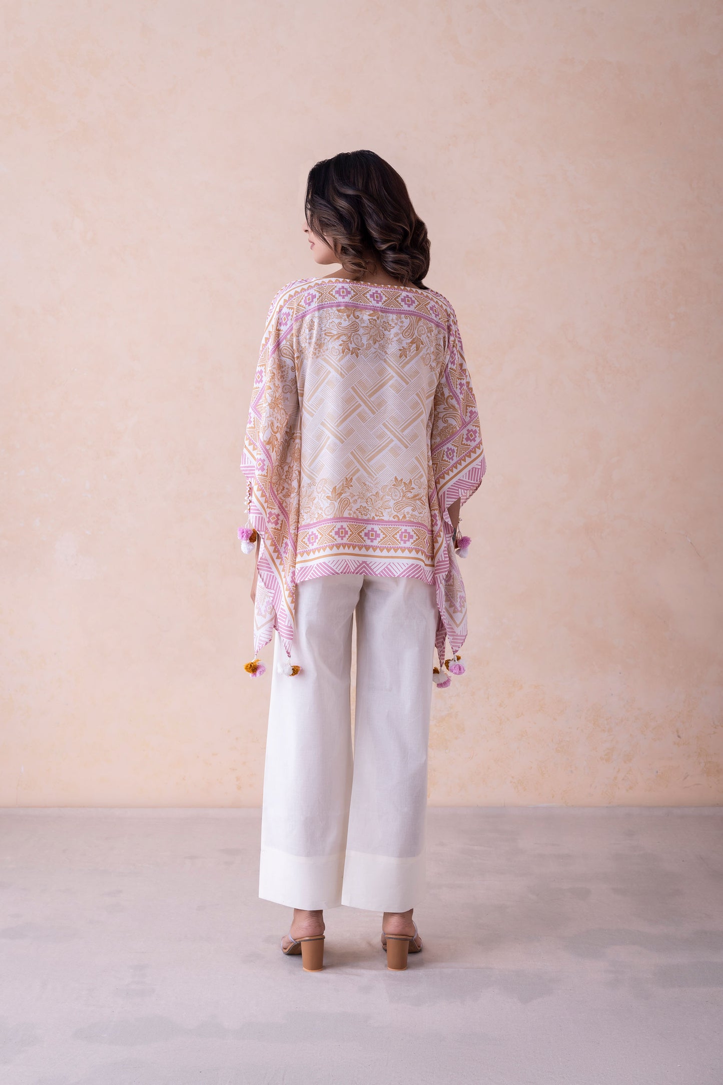 Ridhim Exquisite Bamber Muslin Tassel Embellished Kurti Top