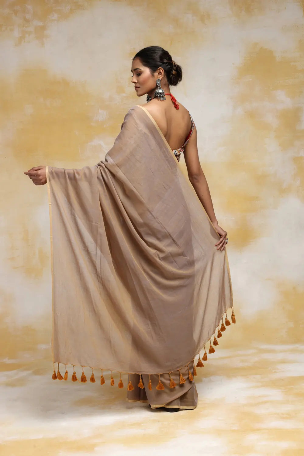 Handloom Clay Beige Mulmul Cotton Saree With Tassels