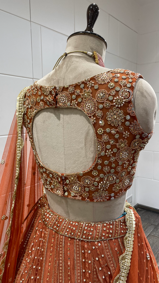 Rust Chinnon Lehenga With Pearl Sequins & Pot Embellishments