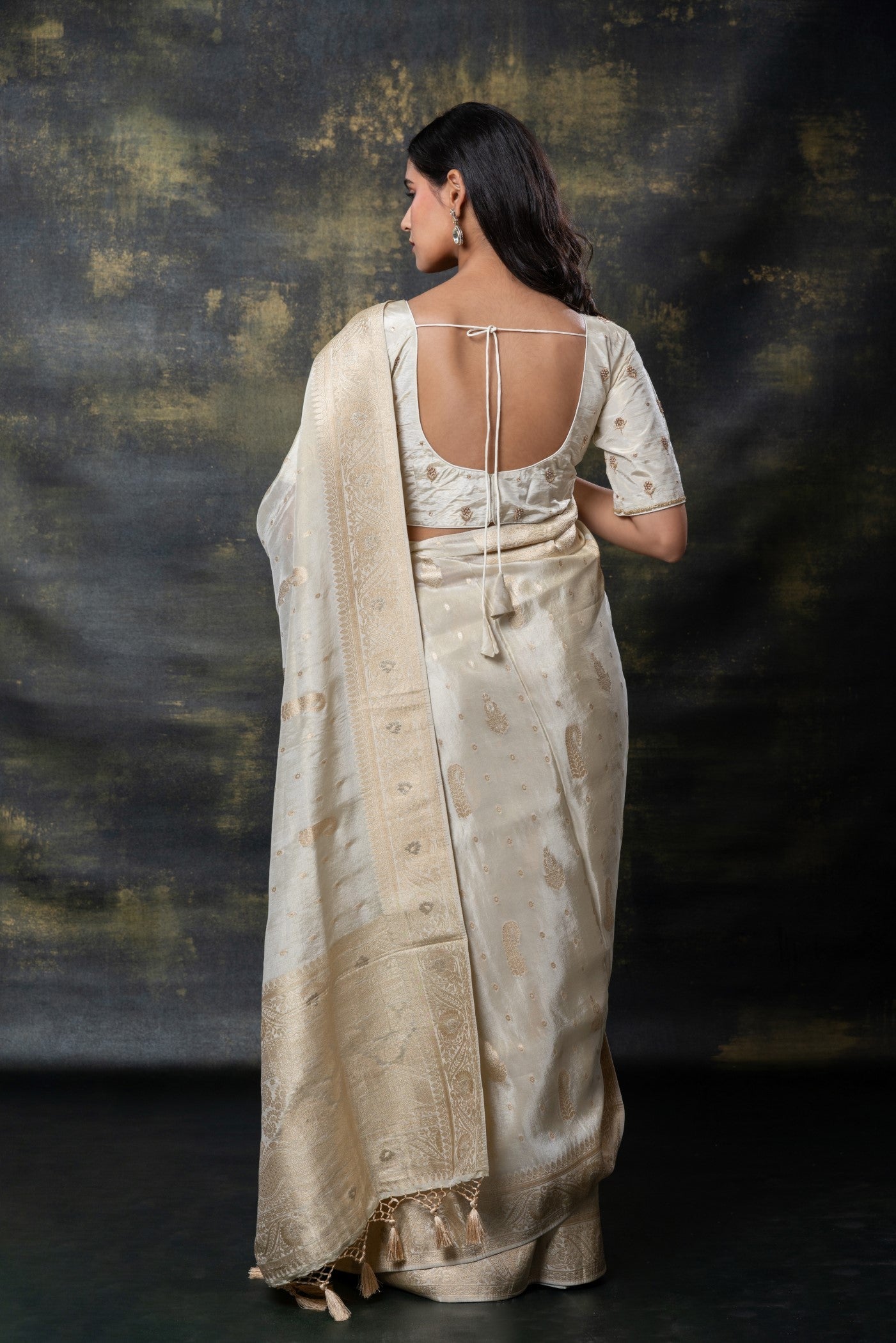 Cream white banarasi silk tissue hand work saree