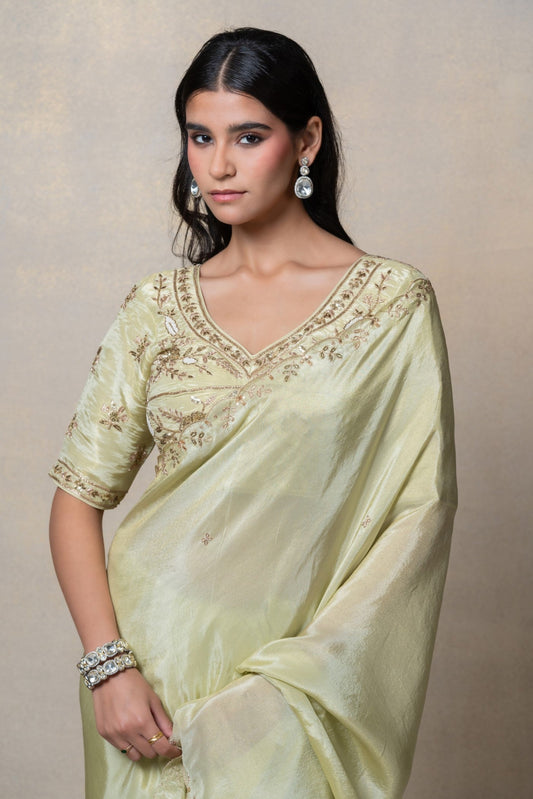 Pista green silk saree with zari embroidery