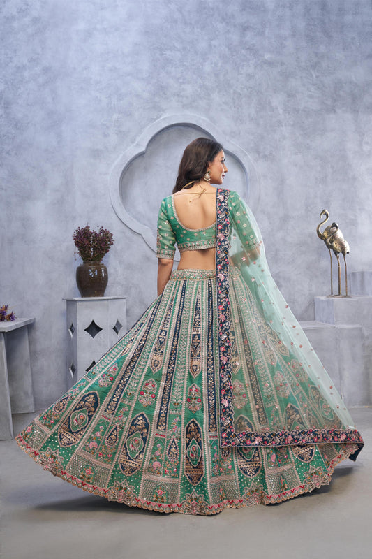Green Organza Silk Intricate Paisley Motifs Embroidered Wedding Lehenga Choli