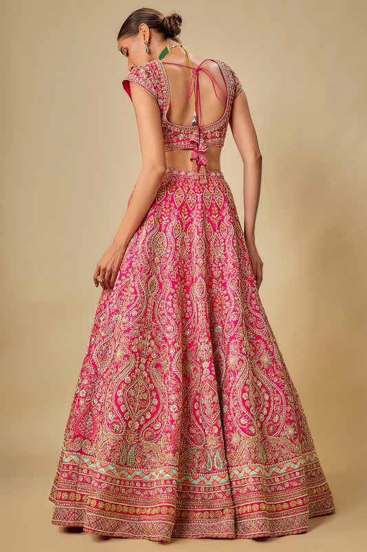 rani pink raw silk hand & machine embroidered lehenga set
