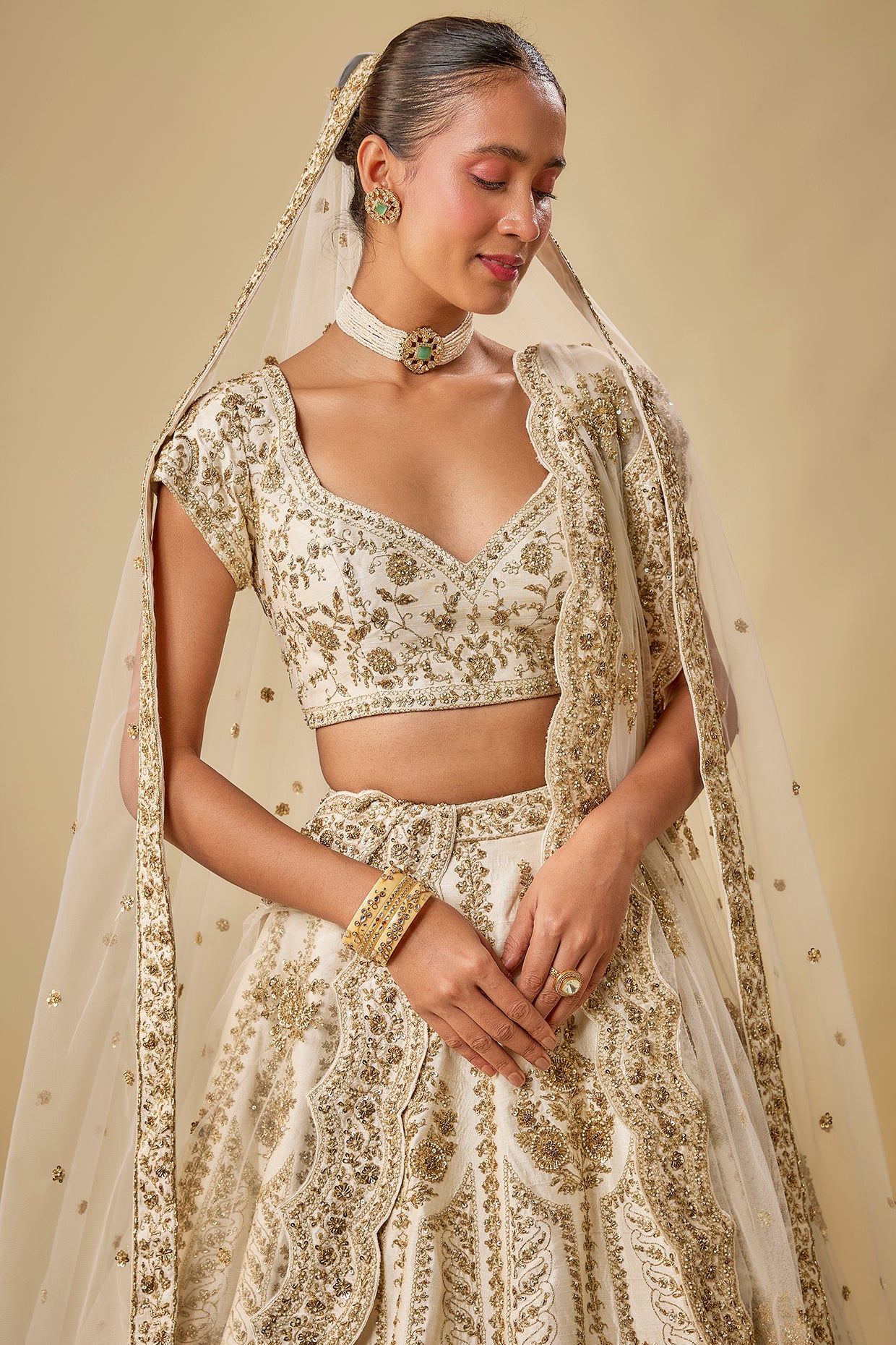 ivory raw silk hand & machine embroidered lehenga set