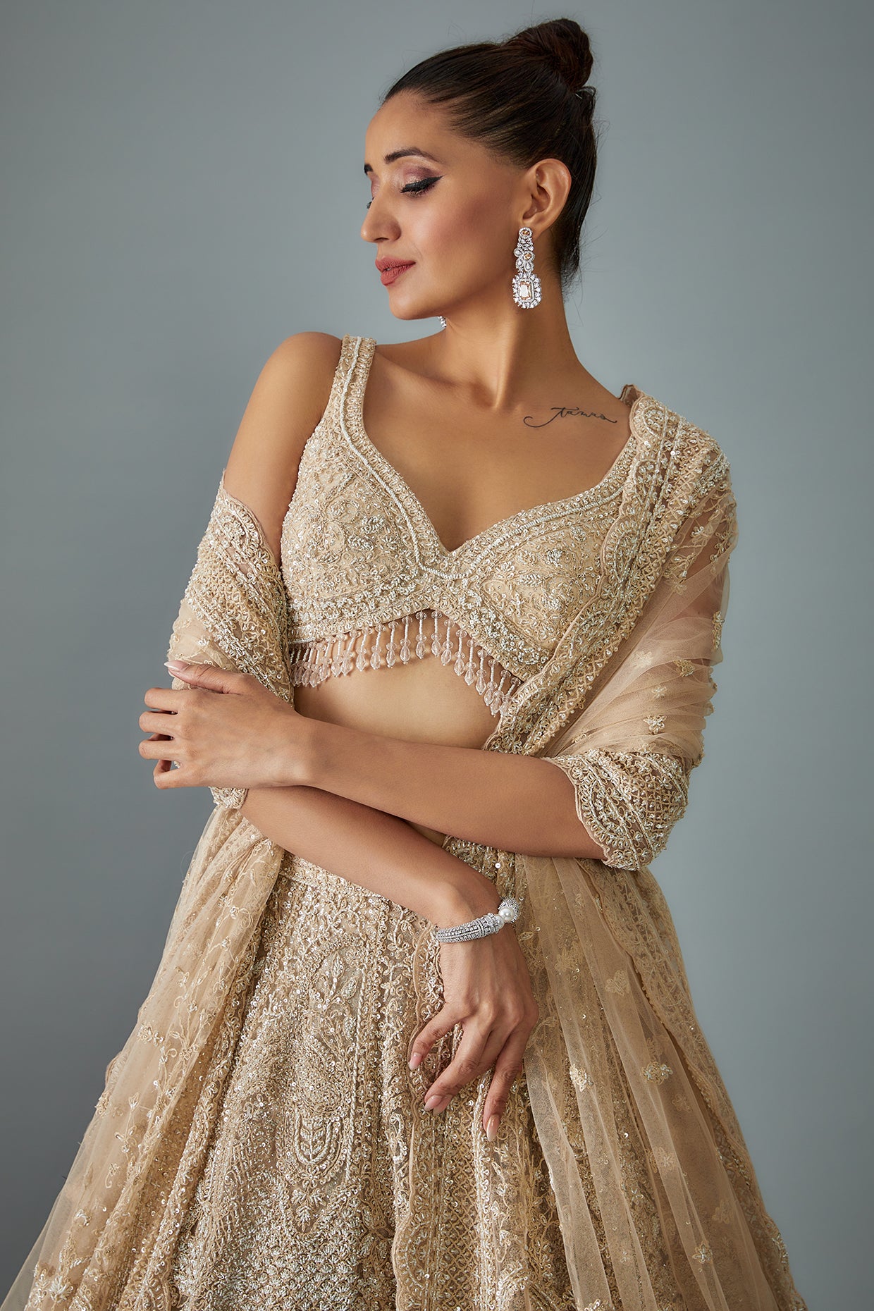 gold net hand embroidered lehenga set