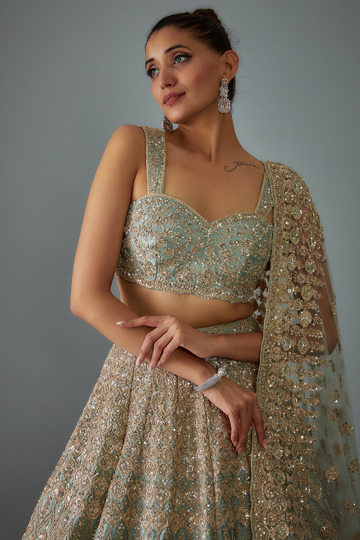 dusty firoza raw silk hand embroidered lehenga set