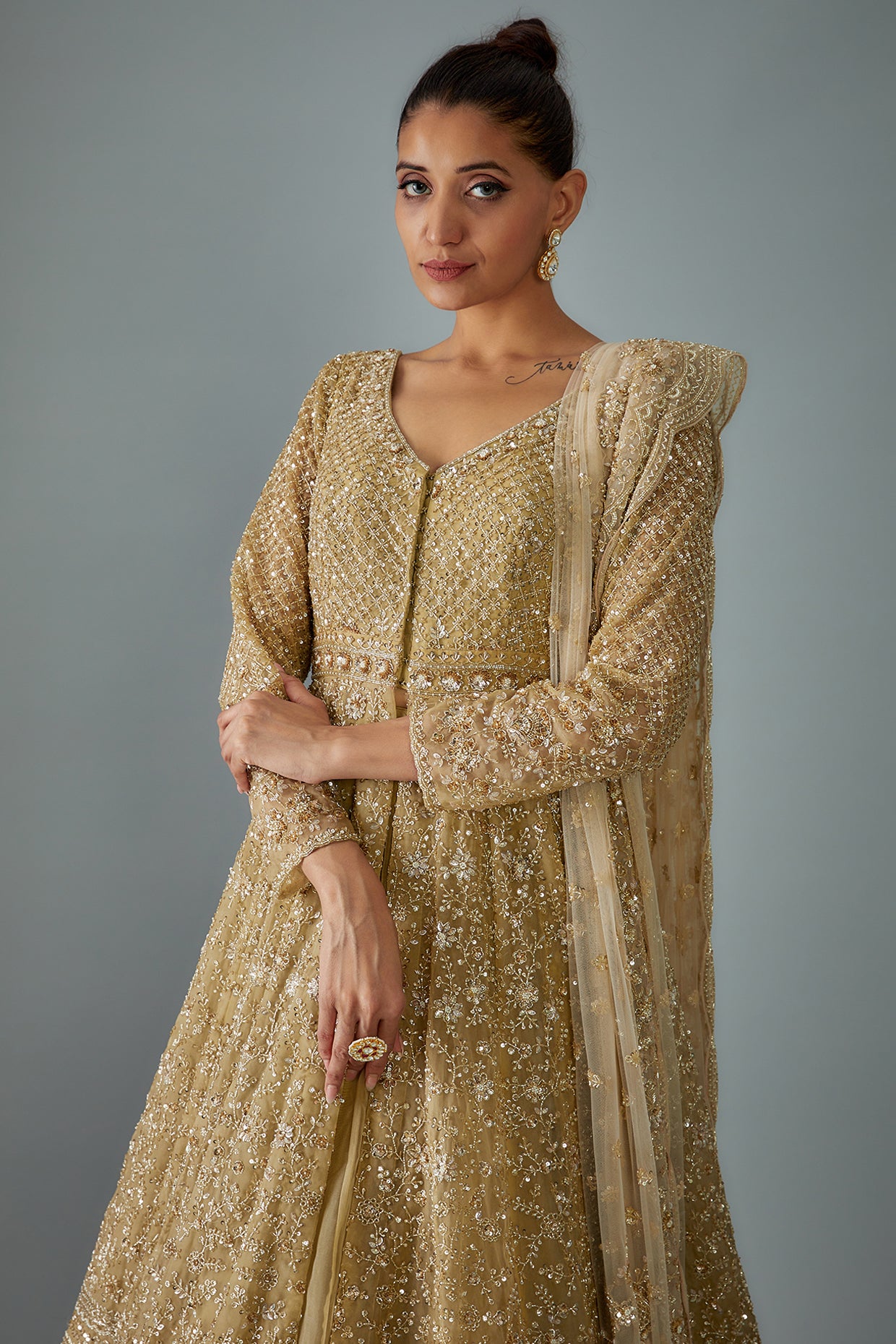 gold net hand embroidered jacket lehenga set