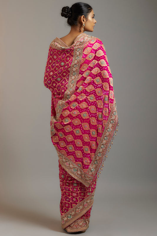 rani pink silk sequins embellished bandhej patola saree set