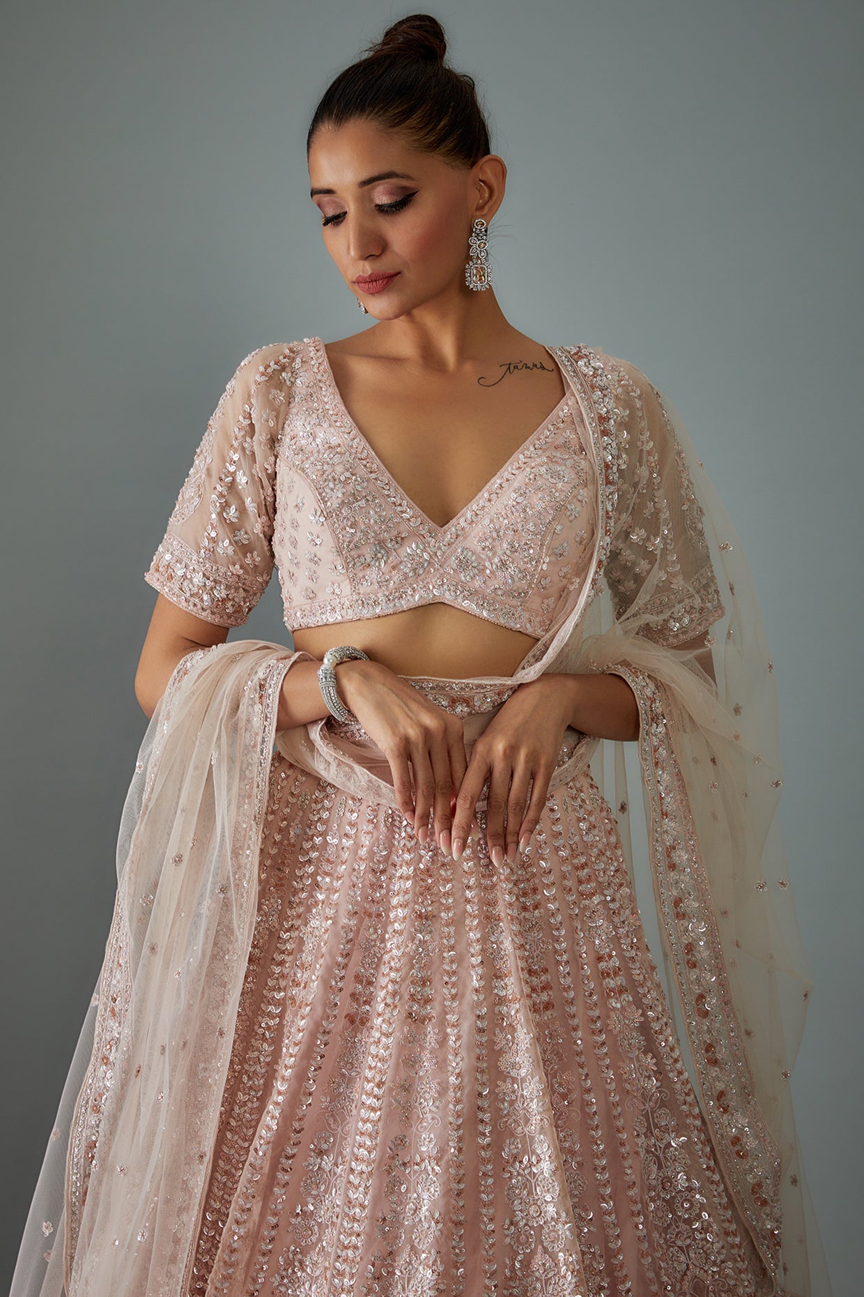 pink net hand embroidered lehenga set