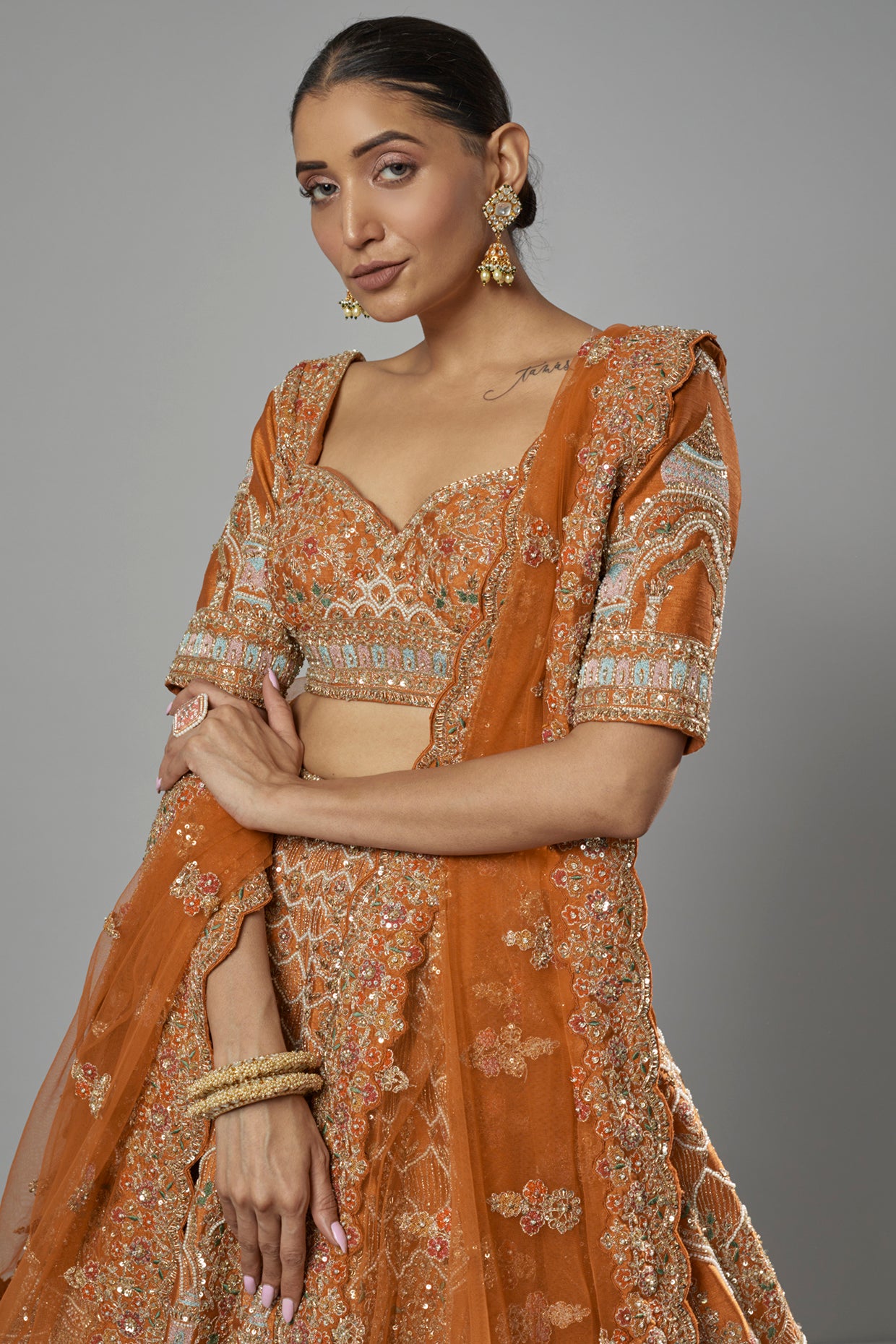 rust raw silk embroidered lehenga set