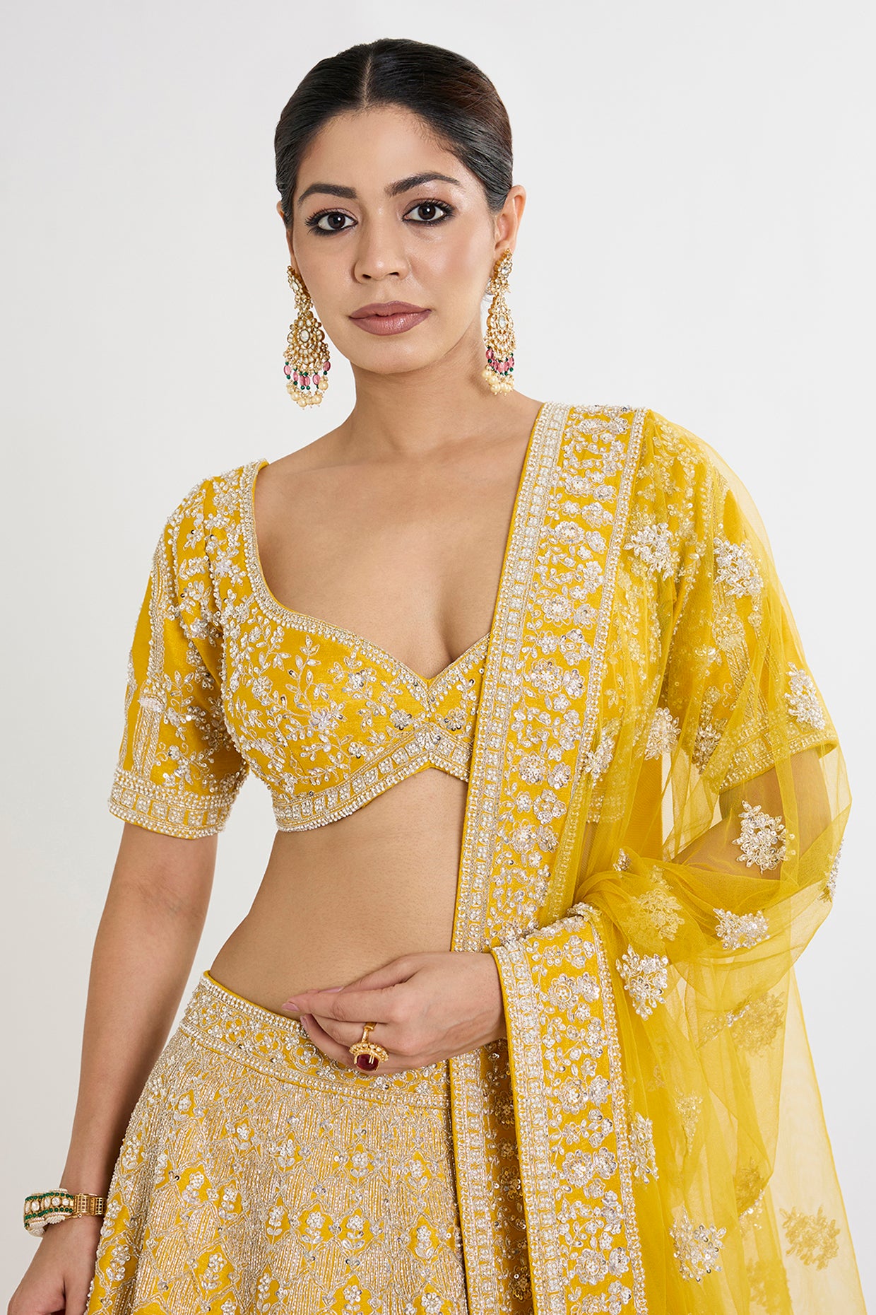 yellow raw silk cutdana embellished lehenga set