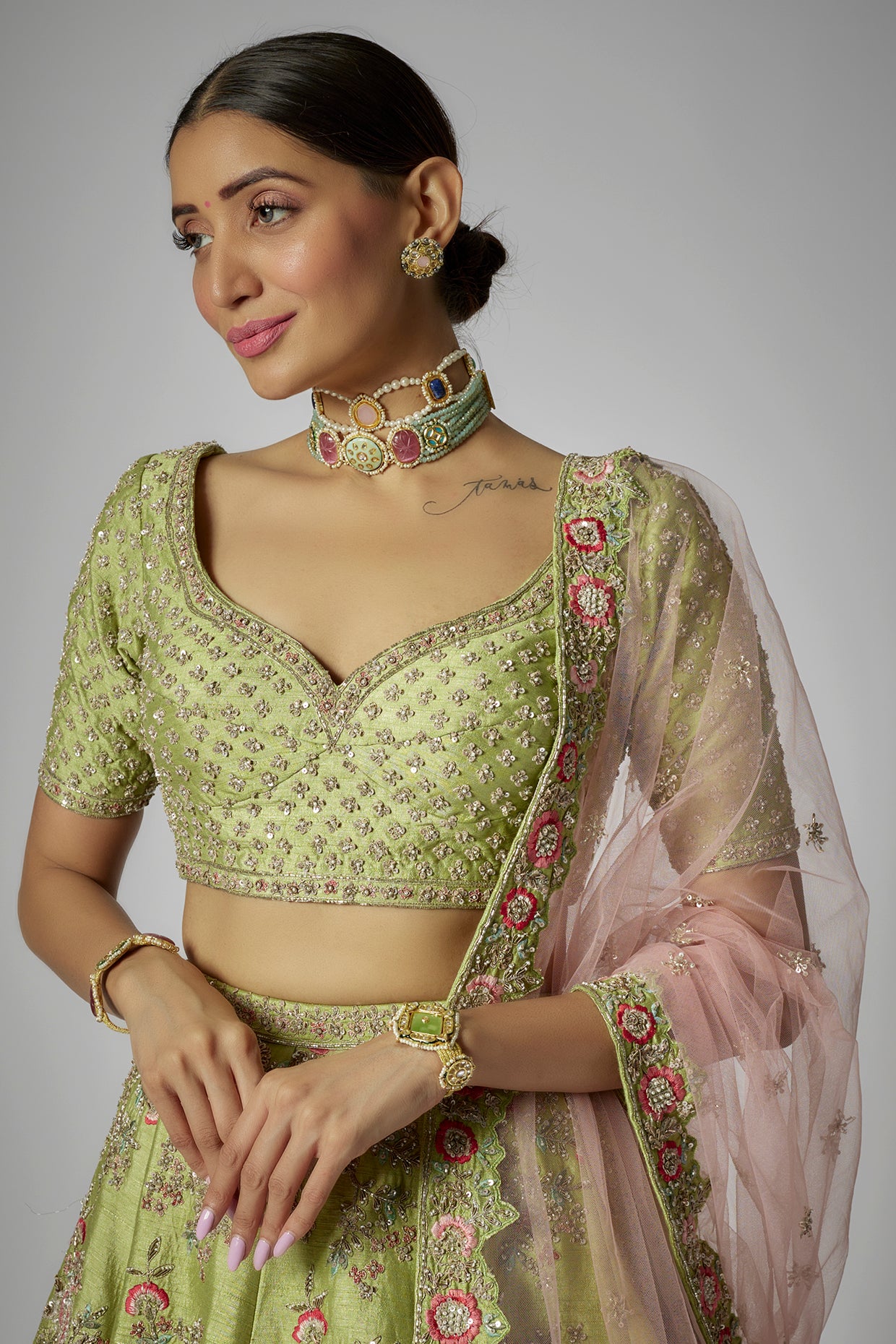 green raw silk embroidered lehenga set
