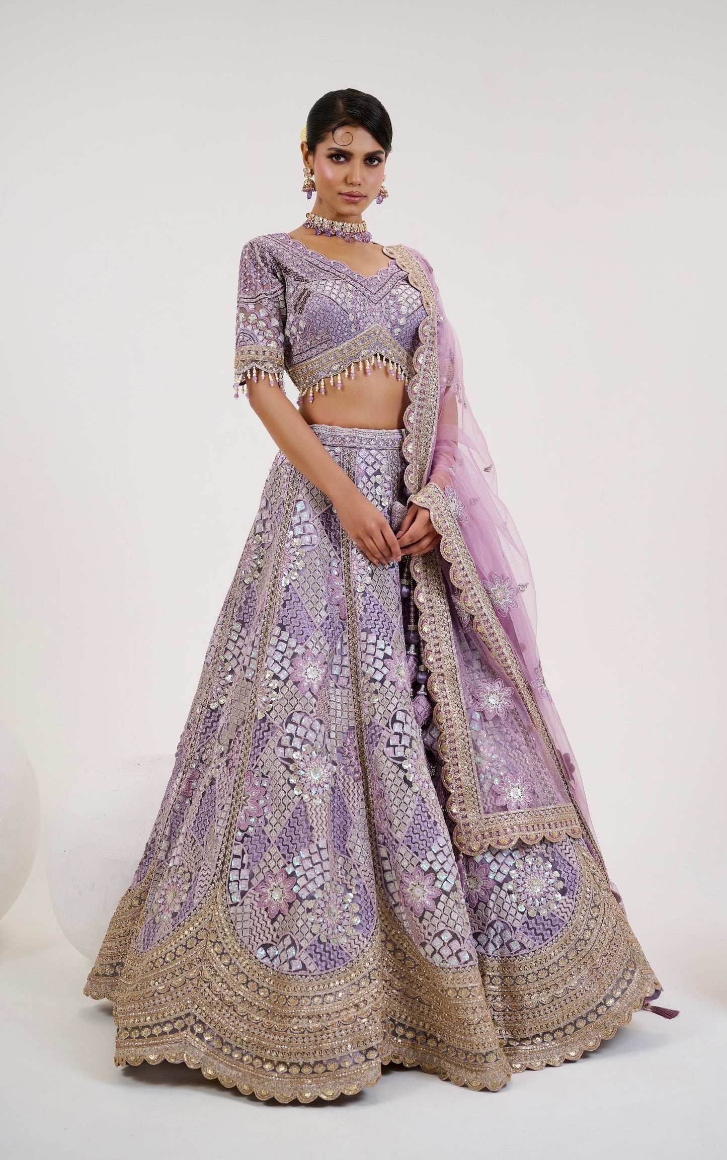 Lavender Sequins Embroidered Net Sangeet Lehenga Choli